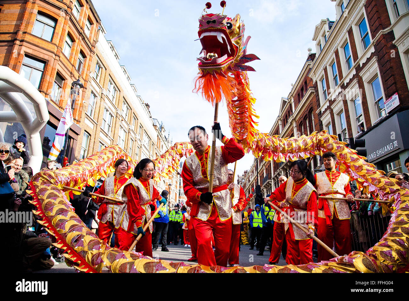 London, UK. 14th February 2016. The Chinese Dragon dances at the Chinese New Year Parade  2016 - The Year of the Monkey in central London with the biggest celebration outside of Asia. Costumed performers took part in the Chinese New Year Parade along Charing Cross Road and Chinatown, with further celebrations in Trafalgar Square. The event is organised by London Chinatown Chinese Association. Credit:  Dinendra Haria/Alamy Live News Stock Photo
