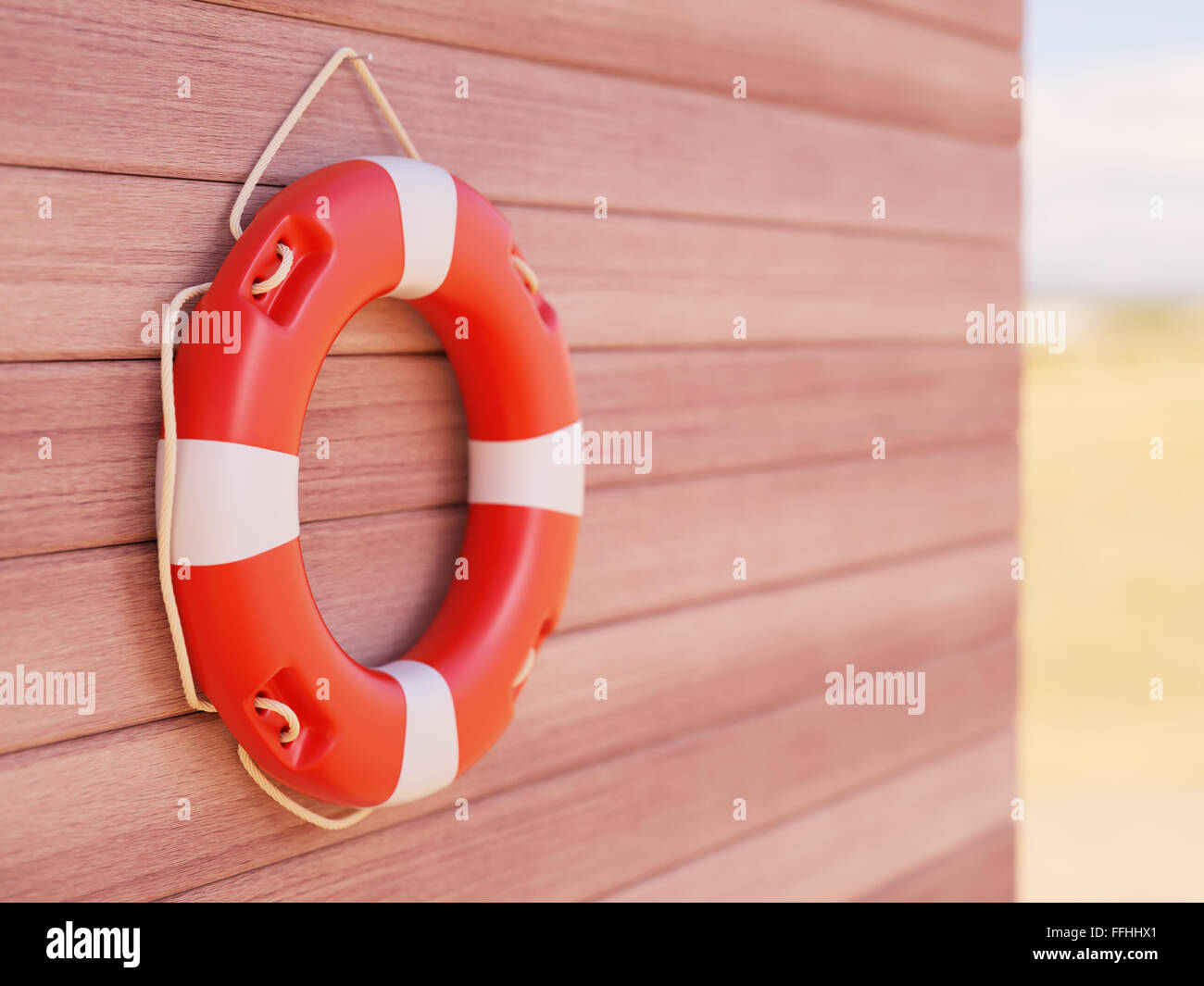 Lifebuoy on a wall background Stock Photo - Alamy