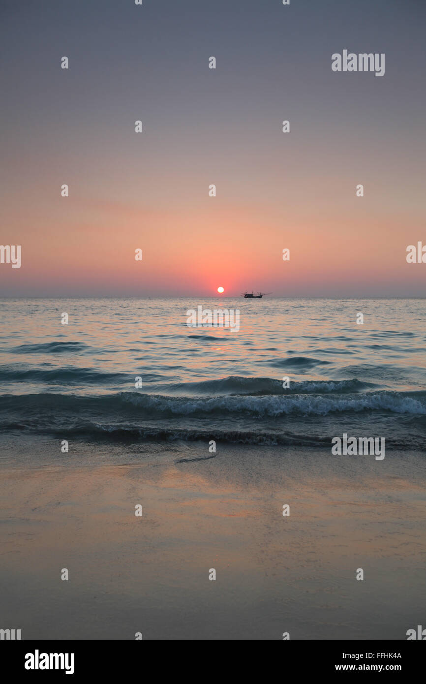 Fishing boat at sunset in Thailand Stock Photo - Alamy