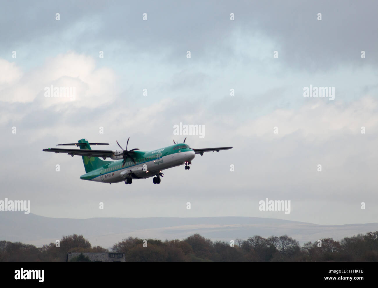Aer Lingus Regional ATR 72-600 twin-engine turboprop short-haul regional airliner (EI-FAU, 'St. Daire') taking off. Stock Photo