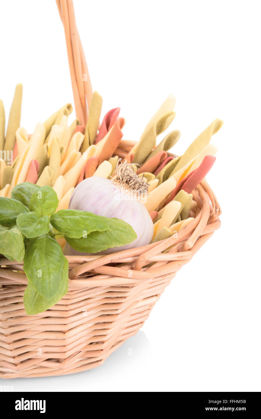Traditional italian pasta in basket isolated on white background Stock