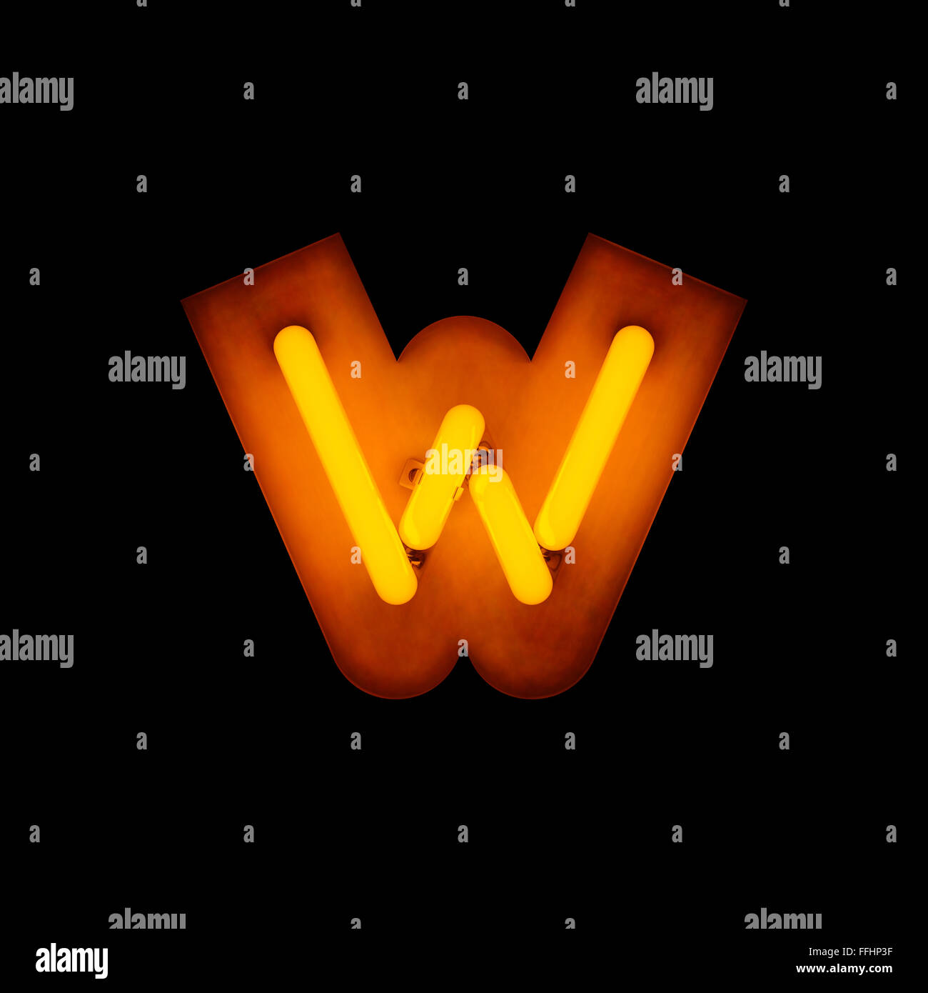 Neon Letter w lower case neon alphabet collection isolated on black Stock Photo