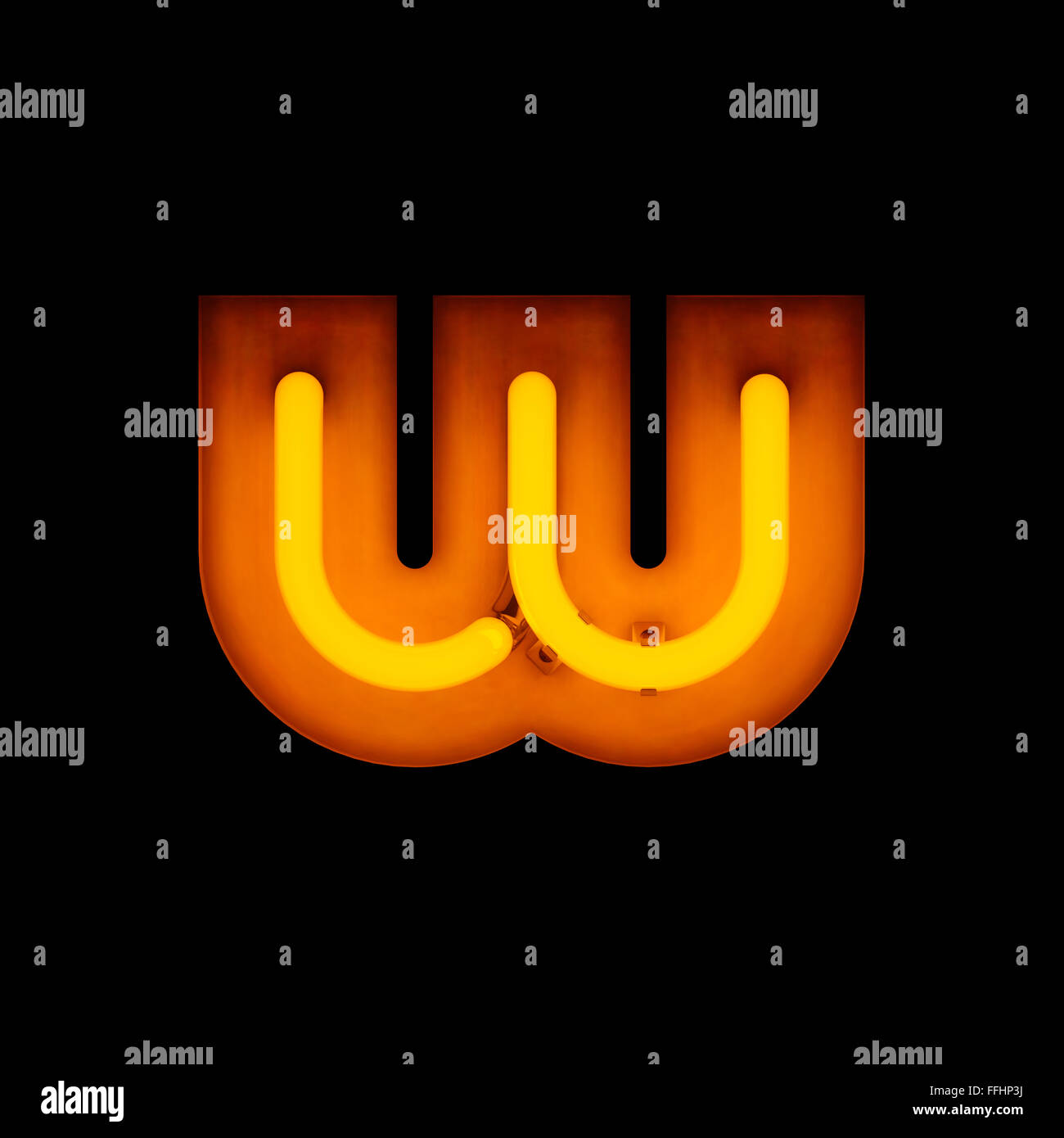 Neon Letter w lower case neon alphabet collection isolated on black Stock Photo