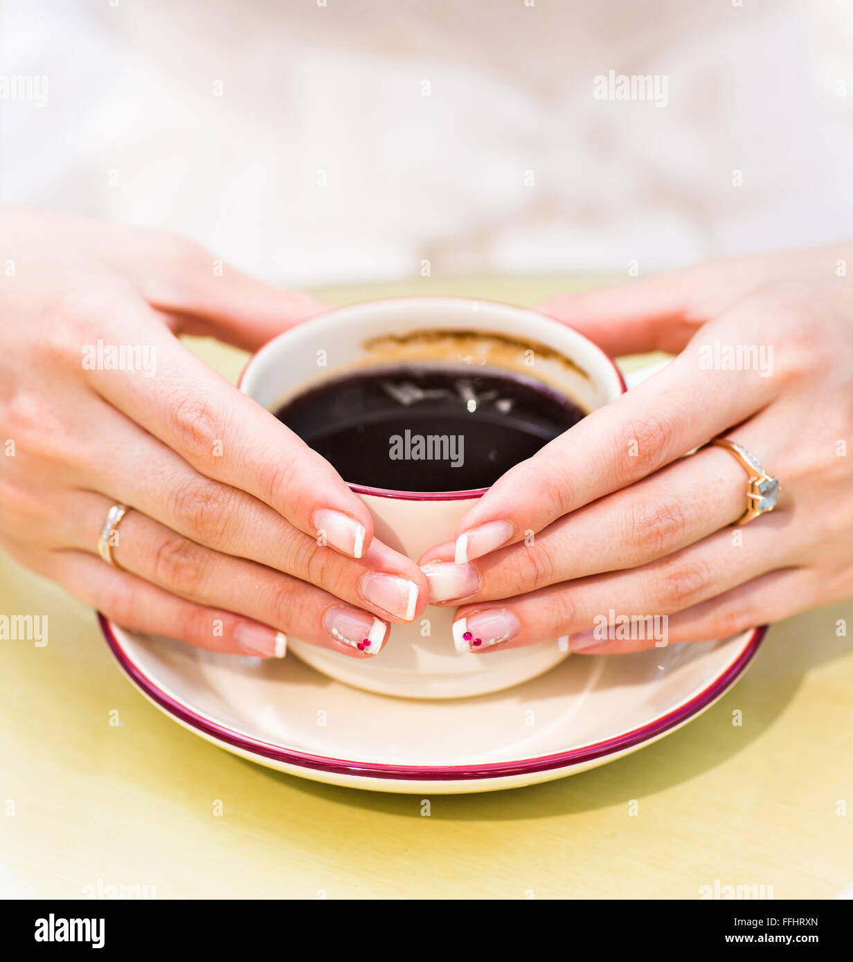 woman holding hot cup of coffee Stock Photo - Alamy
