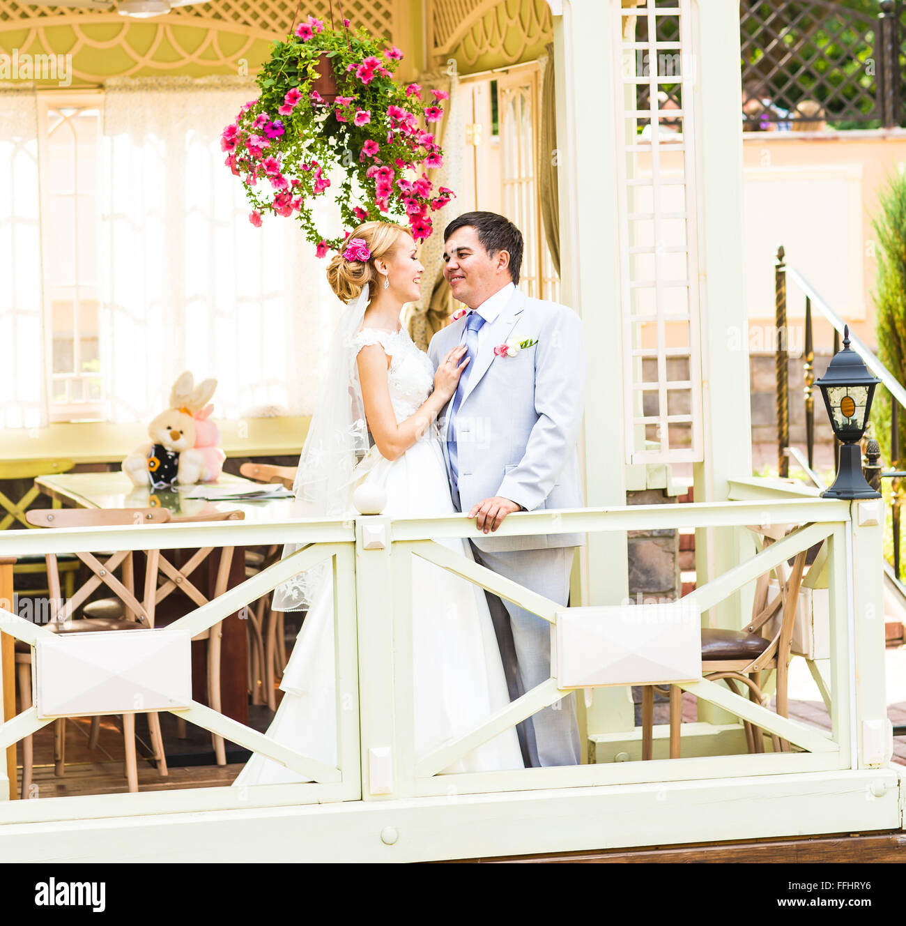 Young wedding couple enjoying romantic moments Stock Photo - Alamy