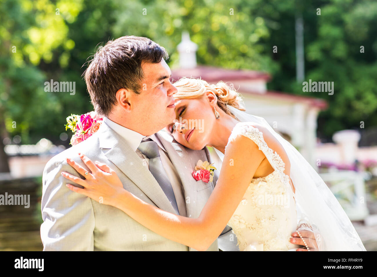 Happy bride and groom on their wedding day Stock Photo - Alamy