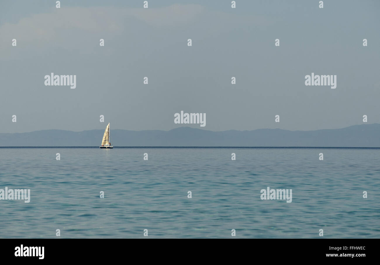 White sailing boat and Aegean sea in Greece Stock Photo - Alamy
