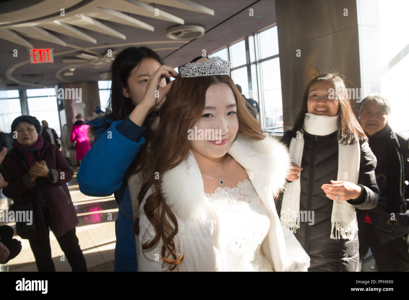 New York, NY, USA. 14th Feb, 2016. Ying Wang and Jinhan Bai of China are married as the Empire State Building hosts Valentine's Day Weddings, Sunday, Feb. 14, 2016. Credit:  Bryan Smith/ZUMA Wire/Alamy Live News Stock Photo