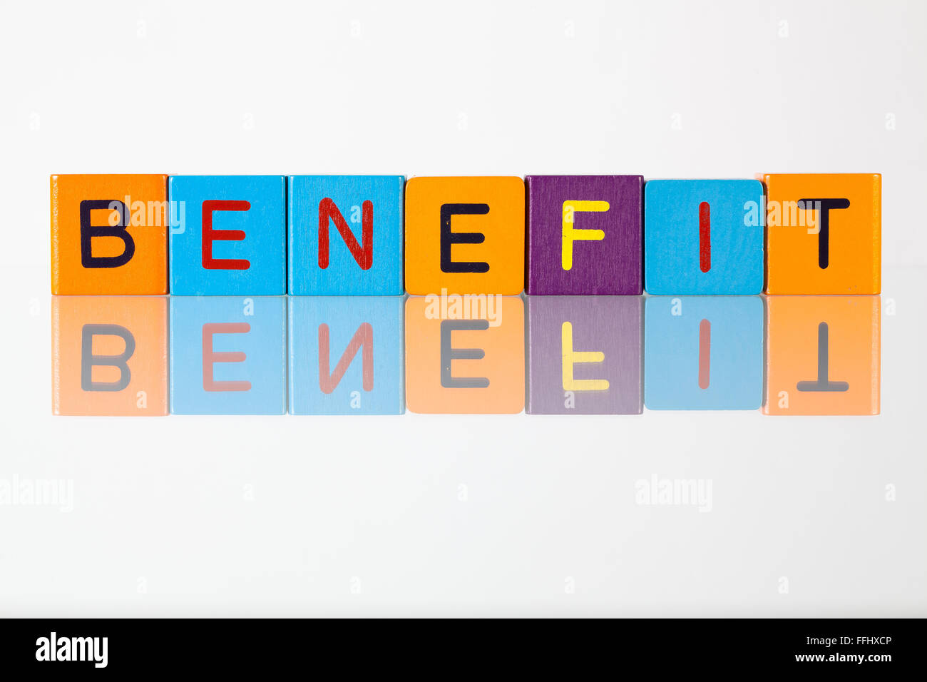 Benefit an inscription from children's wooden blocks Stock Photo Alamy