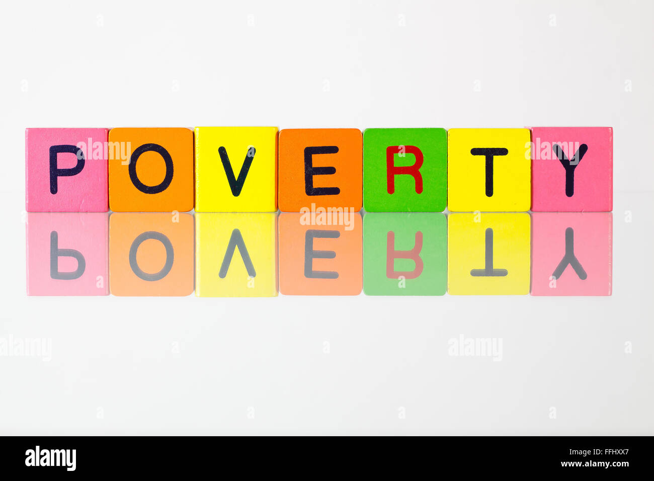 Poverty Lettering Poverty - an inscription from children's wooden blocks Stock Photo - Alamy