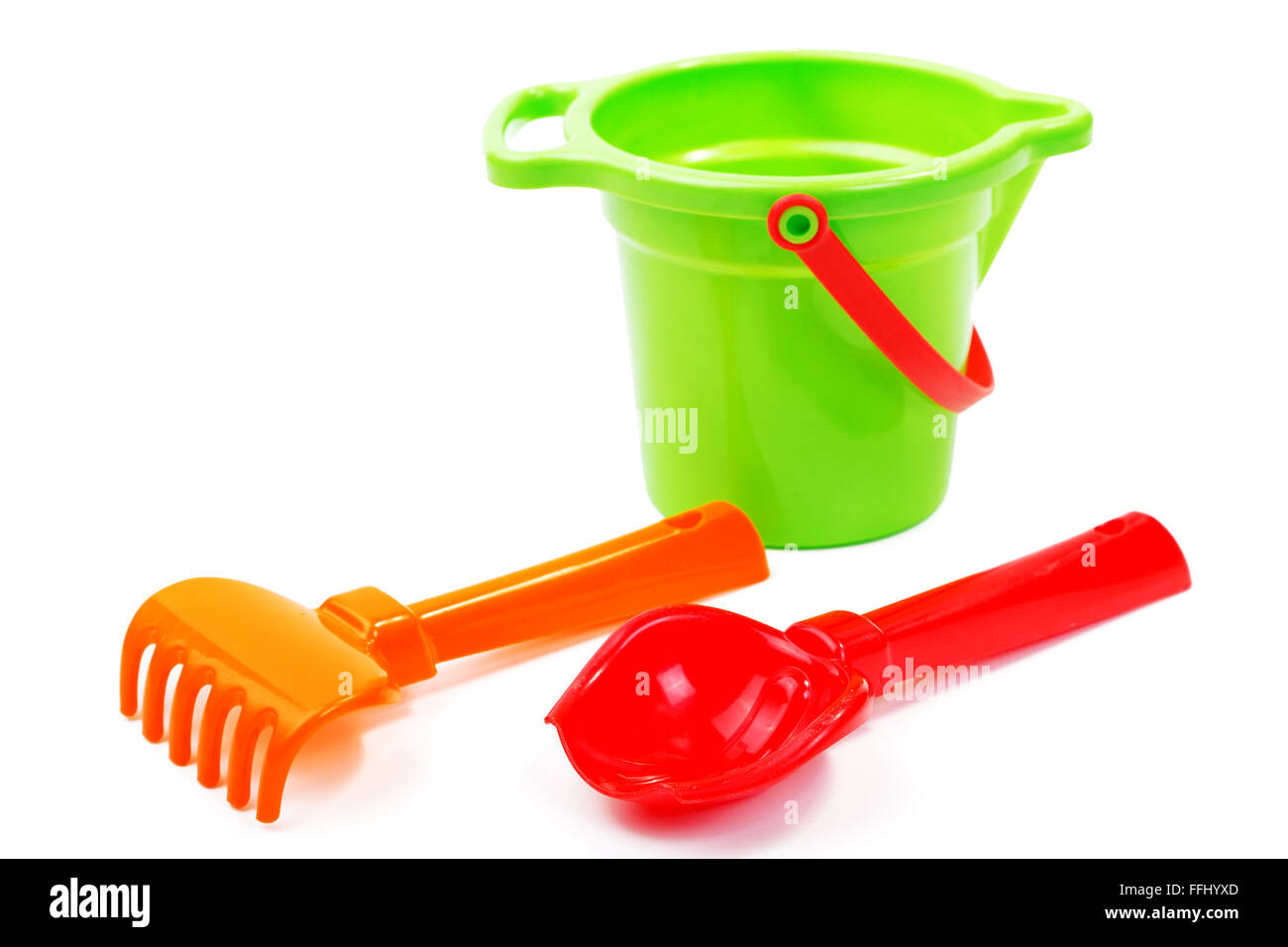 Children's toys bucket shovel and rake on the white Stock Photo Alamy