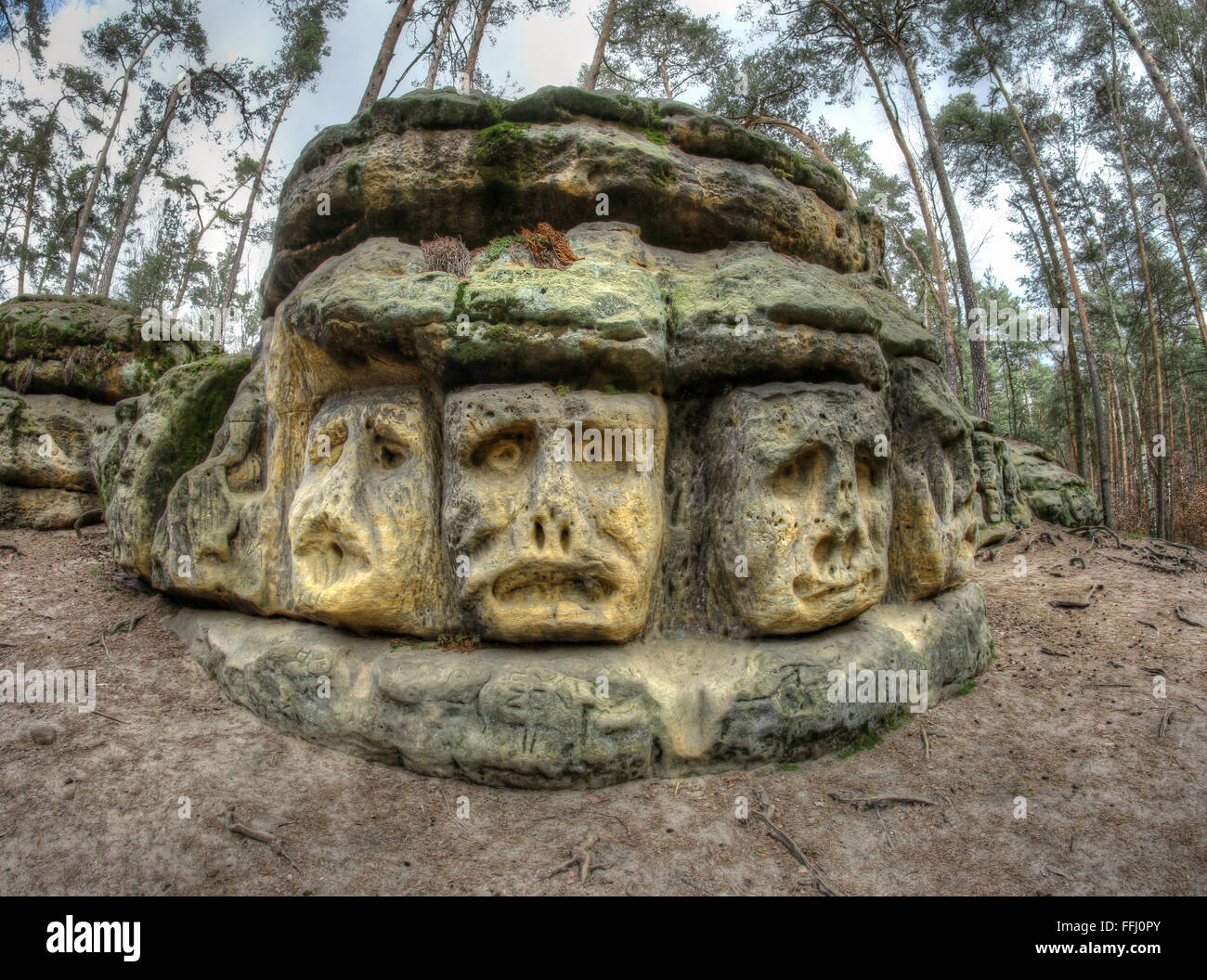 Scary Stone Heads rock sculptures of giant heads carved into the