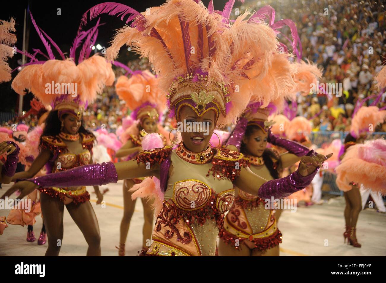 Costumed samba dancers perform in the Sambadrome during the parade of ...