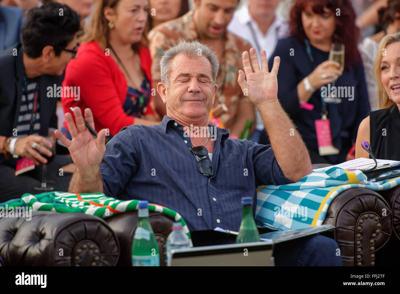 Sydney, Australia. 14th Feb, 2016. Actor/Director Mel Gibson presents Tropfest's first prize to Spencer Susser and Daniel 'Cloud' Campos at Sydney's Centennial Parklands. Mel Gibson is in Australia directing the World War II film Hacksaw Ridge. Credit:  Hugh Peterswald/Pacific Press/Alamy Live News Stock Photo