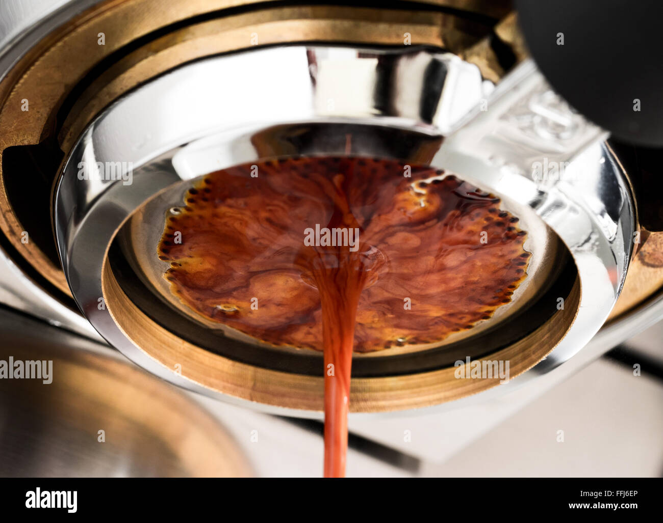 Espresso coffee extraction with bottomless filter Stock Photo Alamy