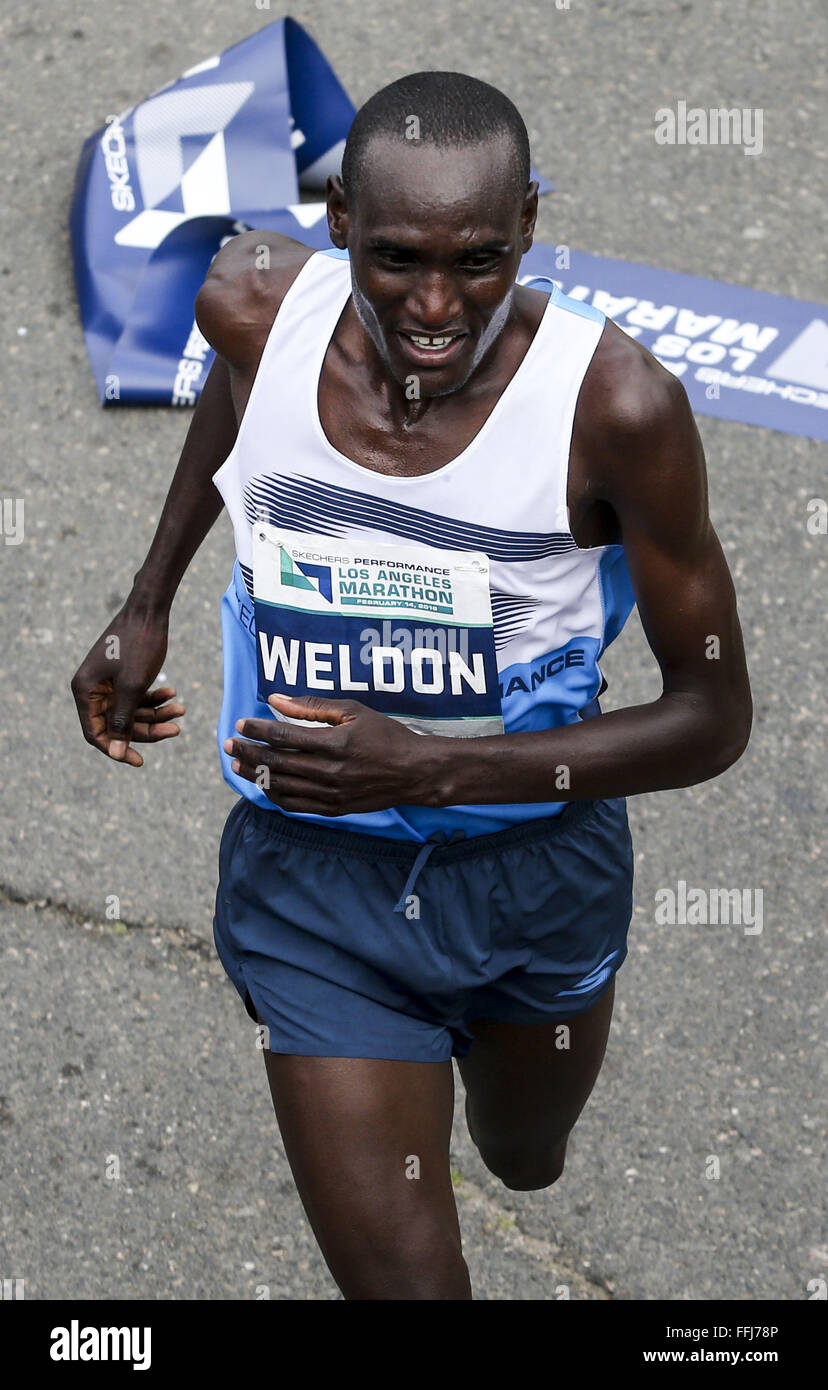 Los Angeles, California, USA. 14th Feb, 2016. Weldon Kirui of Kenya,  crosses the finish line to win the 31st Los Angeles Marathon in Los  Angeles, Sunday, Feb. 14, 2016. The 26.2-mile marathon