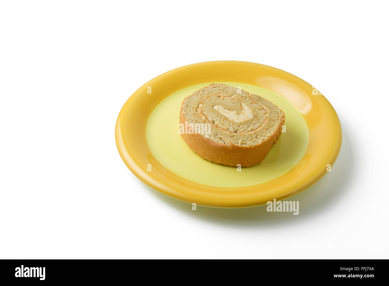 jam roll on plate isolated on white Stock Photo