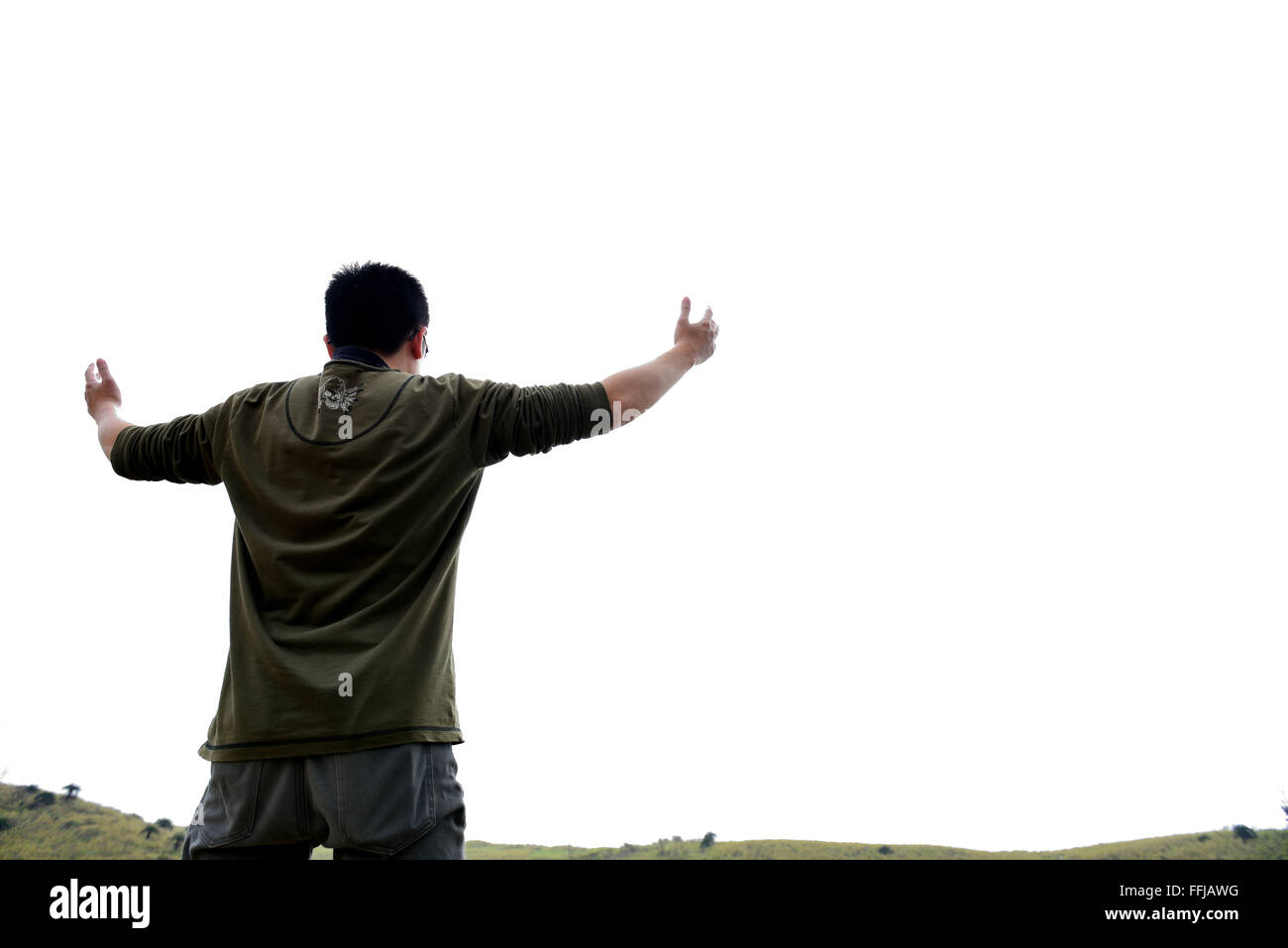 man standing with hands up. Future / freedom / hope / success concept Stock Photo