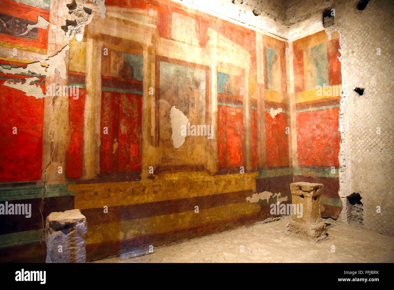 Frescoes cover the wall of a room in the House of Augustus in the Roman Forum in Rome. Stock Photo