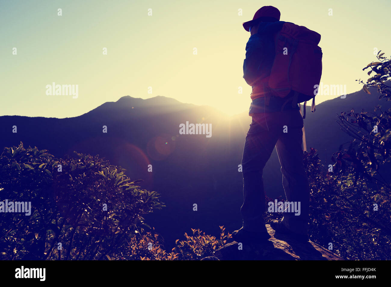 successful woman hiker on sunrise mountain peak Stock Photo - Alamy