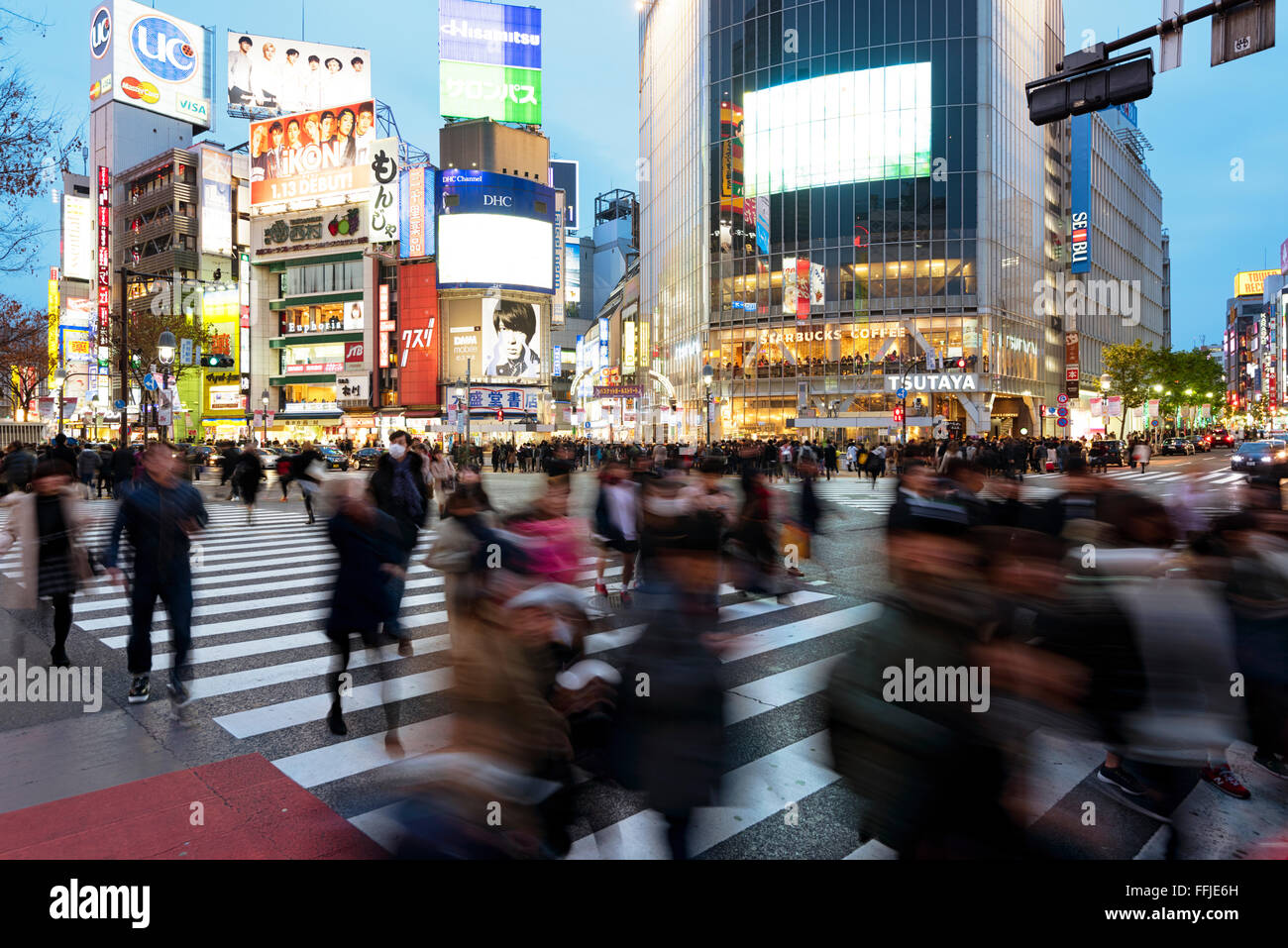 Tokyo, Japan - January 17, 2016: Evening rush hour at the famous Shibuya Crossing in Tokyo, Japan. Stock Photo