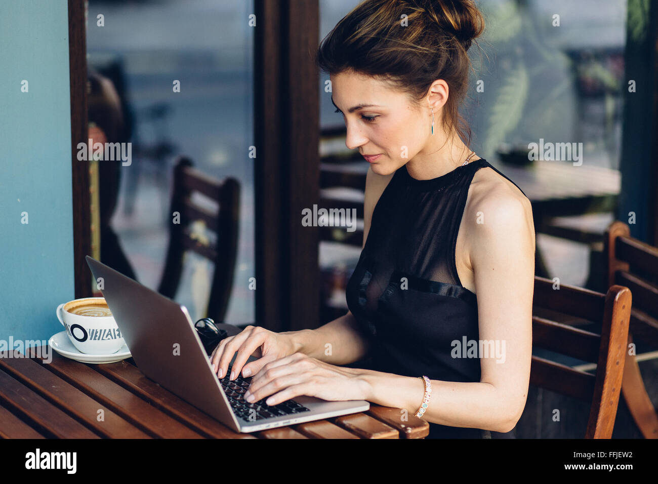 Attractive business woman working at his laptop Stock Photo