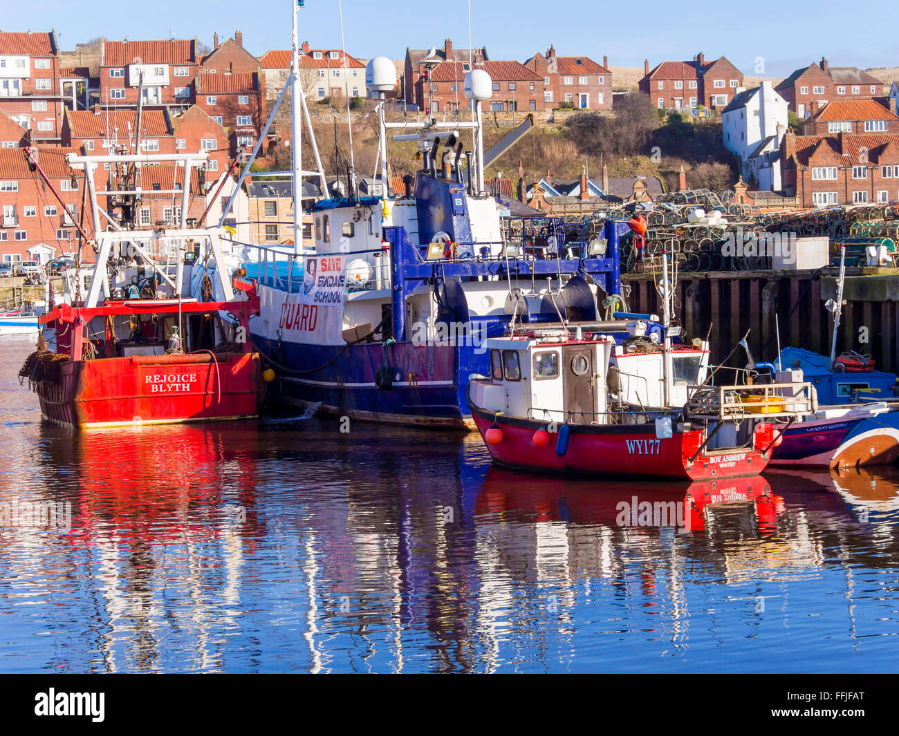 Fishing boats at Endeavour Wharf in Whitby harbour North Yorkshire UK Stock Photo