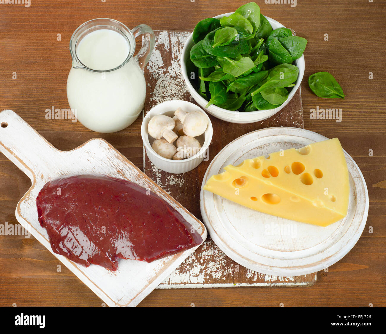 Foods highest in vitamin B2 on wooden board. Top view Stock Photo - Alamy