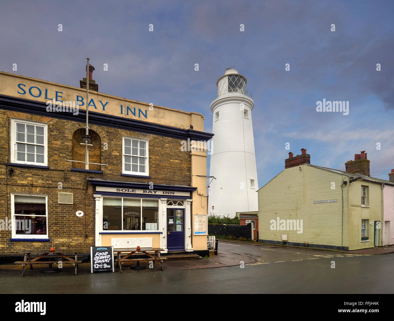 Suffolk Southwold lighthouse and Sole Bay Inn opposite the Adnams