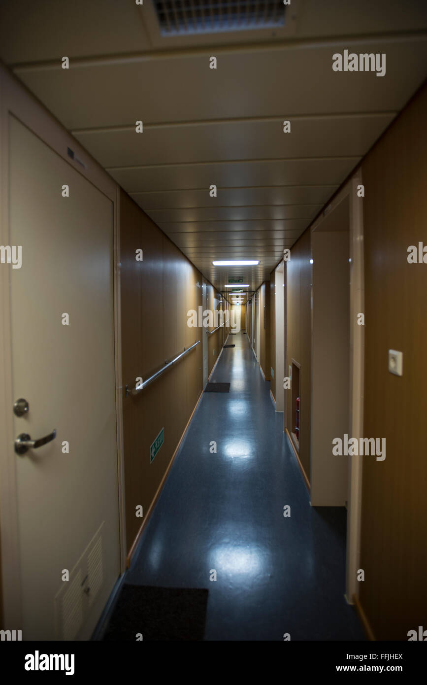 Long corridor inside large container ship Corte Real Stock Photo