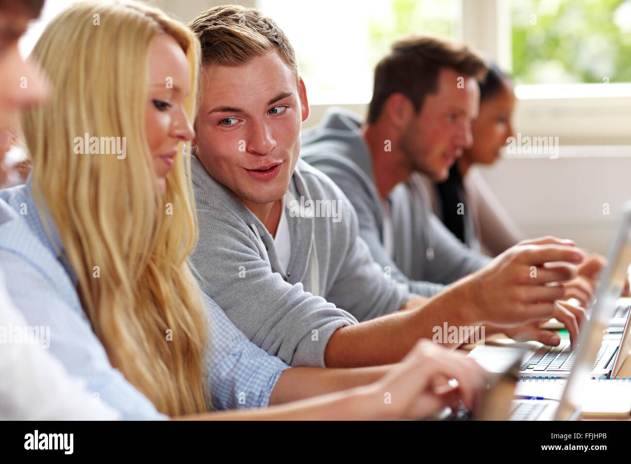 Woman man talking laughing classroom hi-res stock photography and ...