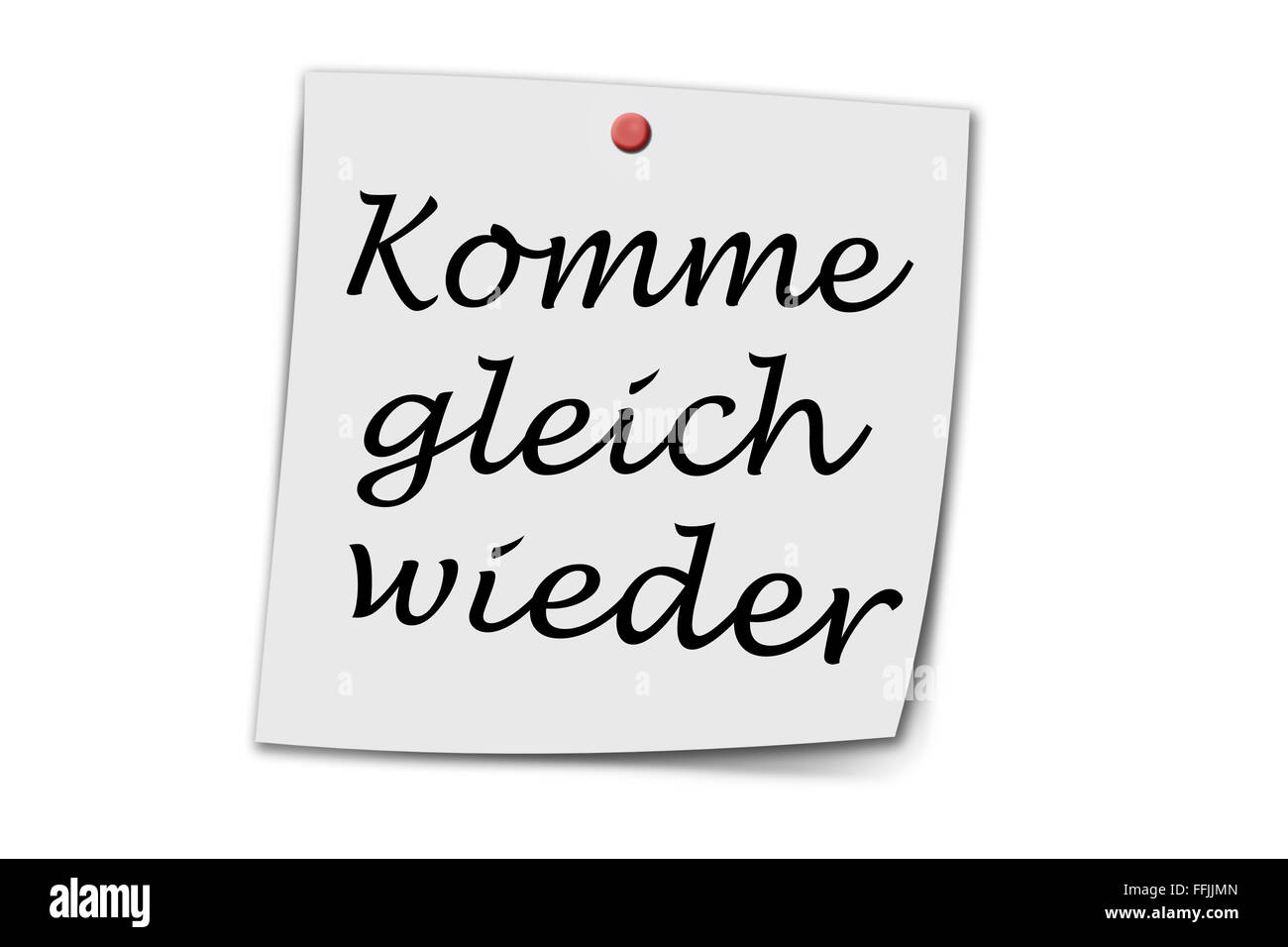 Komme gleich wieder (German Be richt back) written on a memo isolated on white Stock Photo