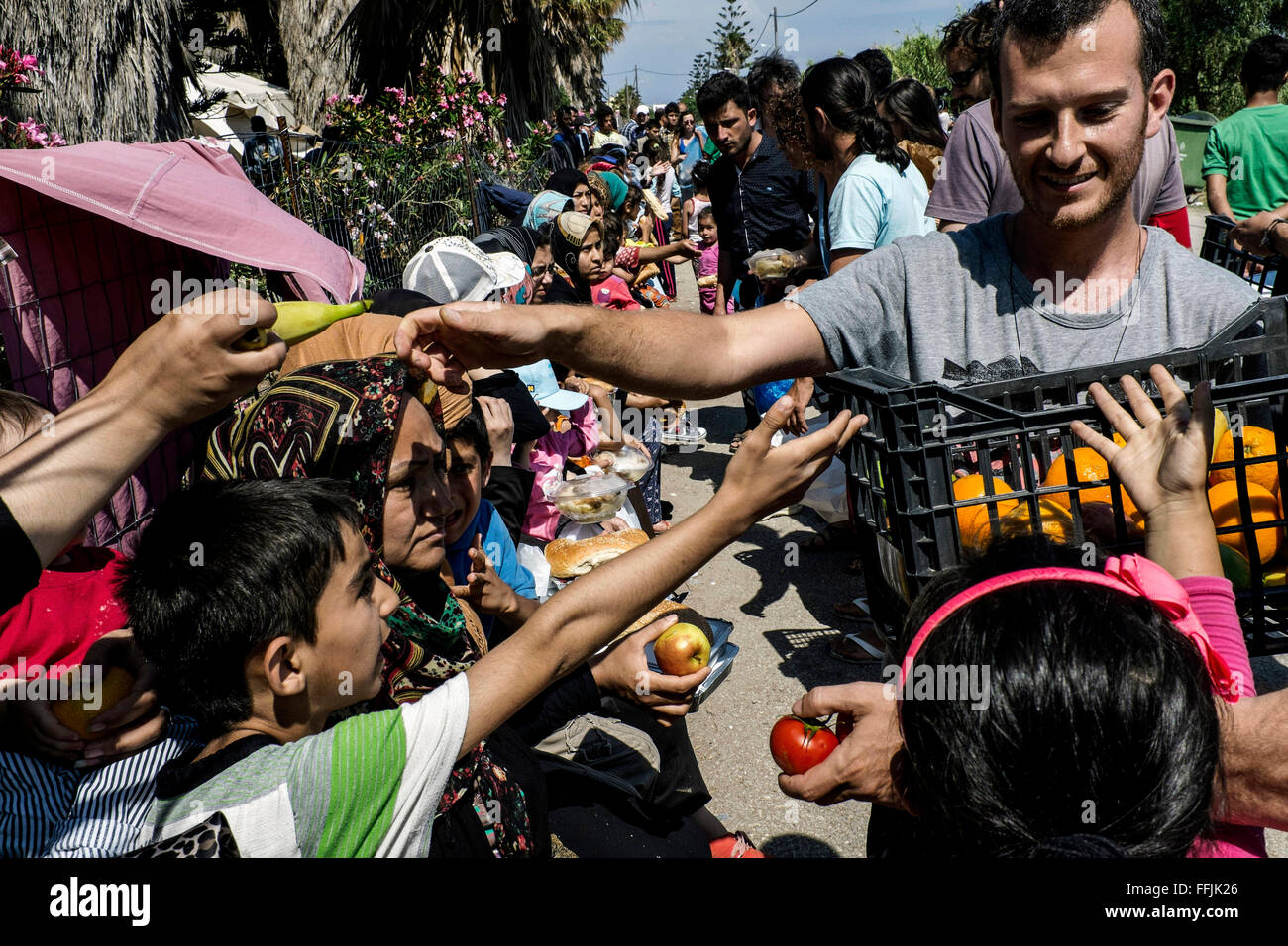 03/06/2015  -  Greece / South Aegean / Kos island  -  People from Solidarity team of Kos distribute food twice a day in Captain Stock Photo
