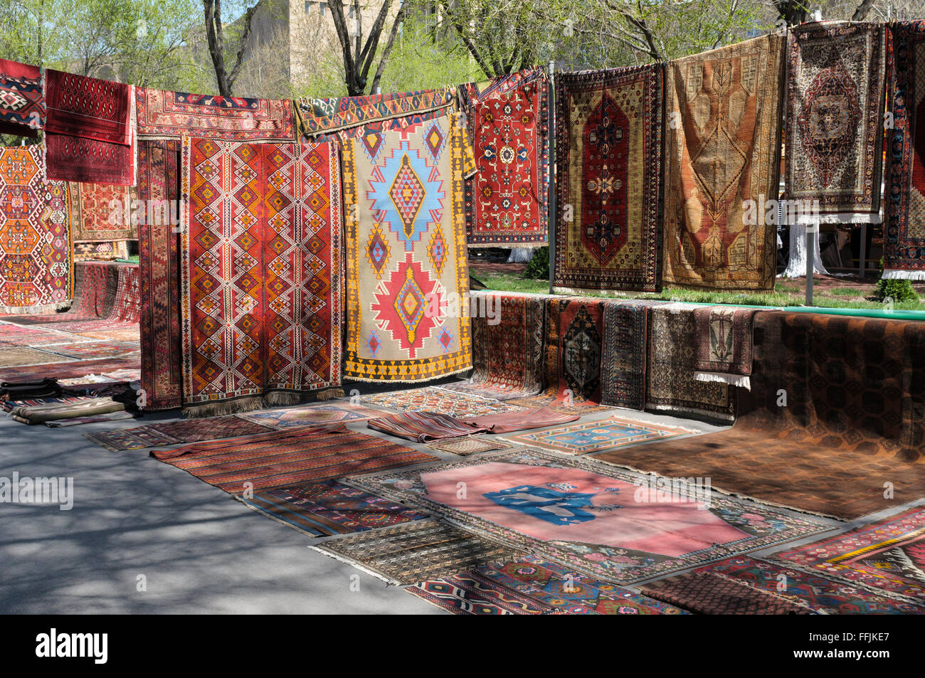 Traditional carpets for sale at the Vernissage open-air flea market, Yerevan, Armenia Stock Photo