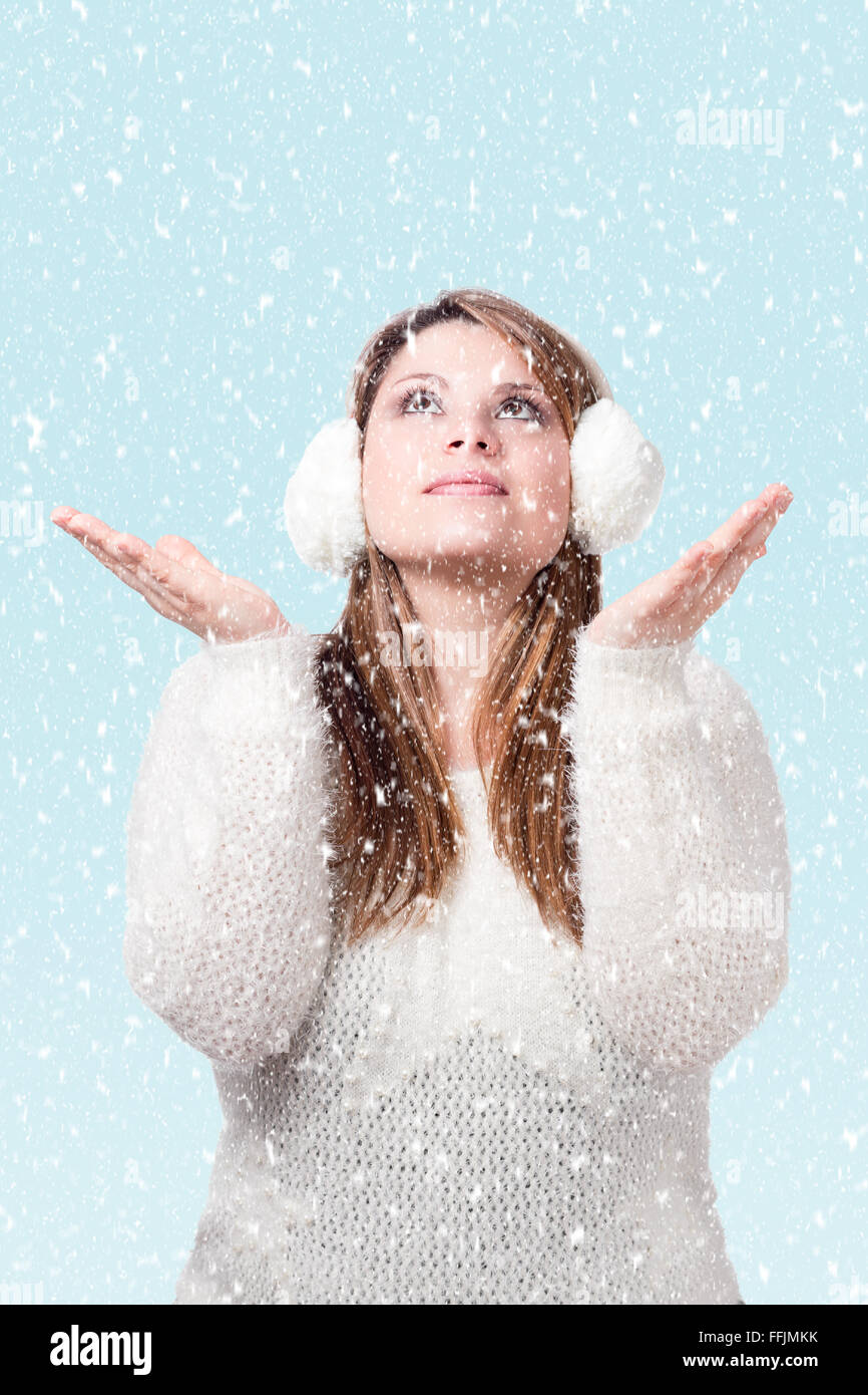 blond girl with earmuffs in snow Stock Photo Alamy