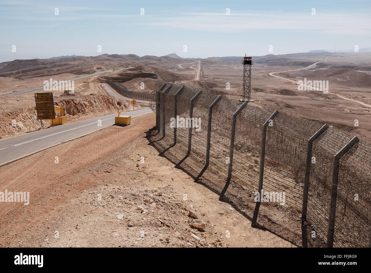 An Egyptian military observation tower stands on the Egyptian side of the “Hour Glass”, Israel-Egypt border fence, which is 5 me Stock Photo