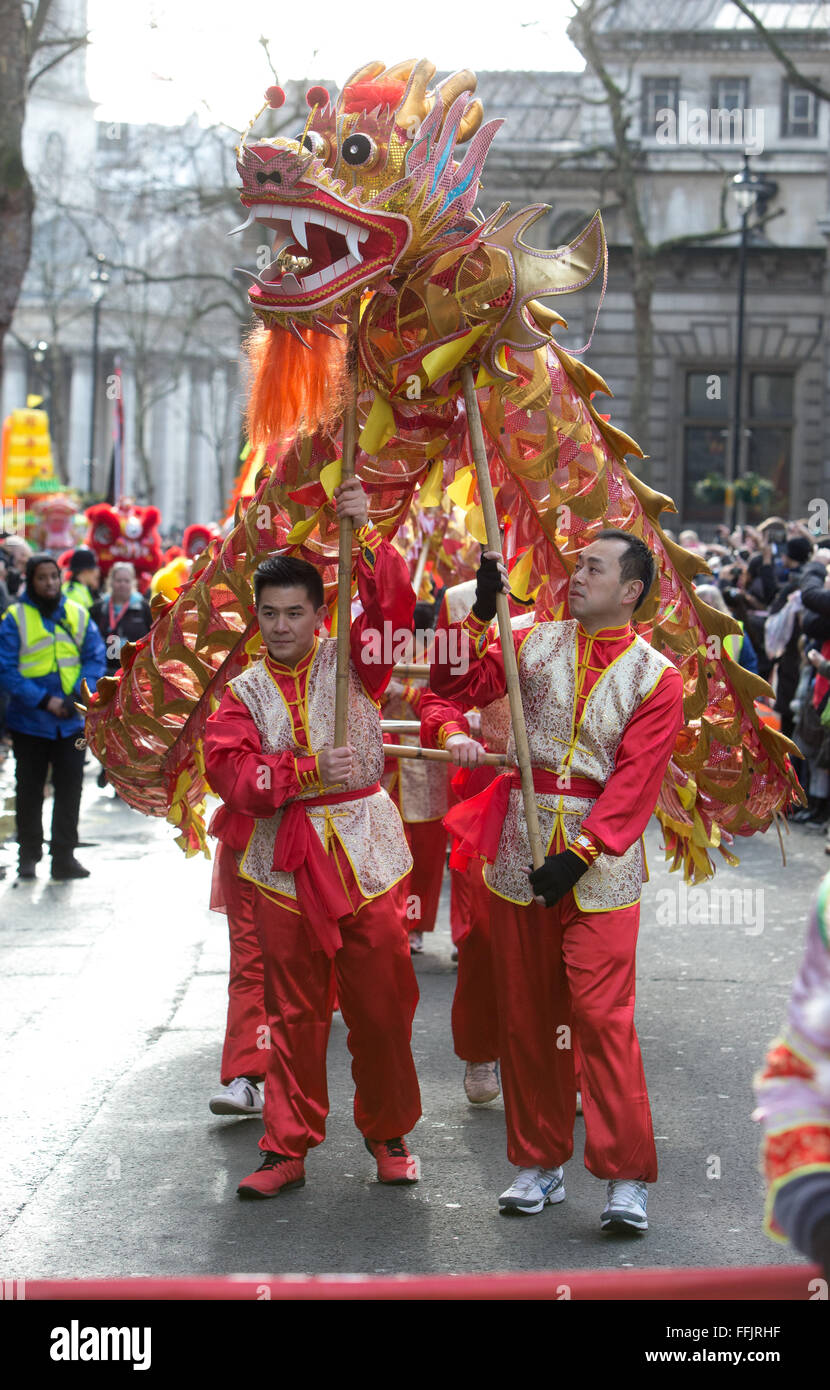 Thousands of people lined the London streets for the Chinese New Year celebrations.This year celebrated the Year of the Monkey Stock Photo
