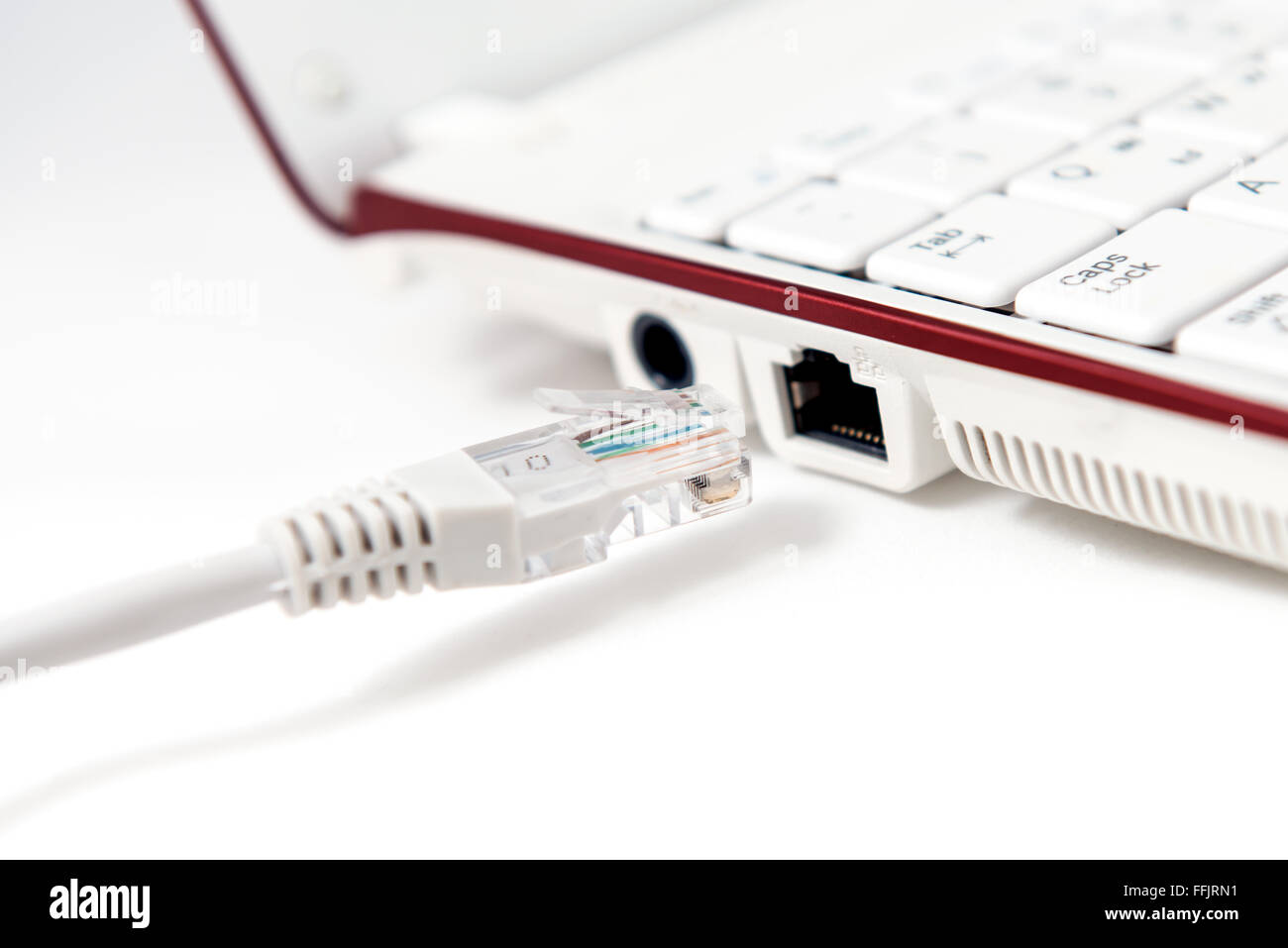 LAN cable is connecting internet to laptop Stock Photo - Alamy