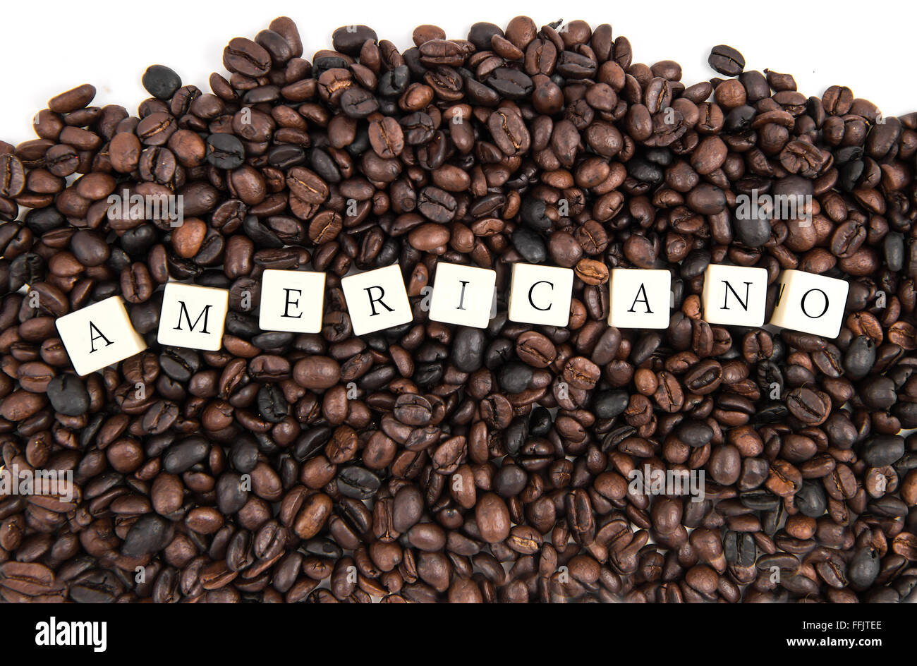 AMERICANO white cube text on white background AND coffee beans background Stock Photo