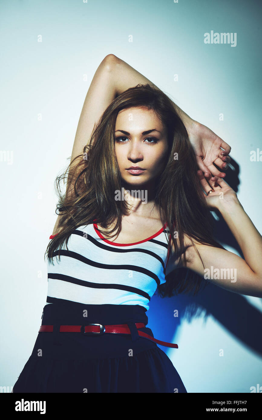 teenage model girl wearing a striped dress Stock Photo