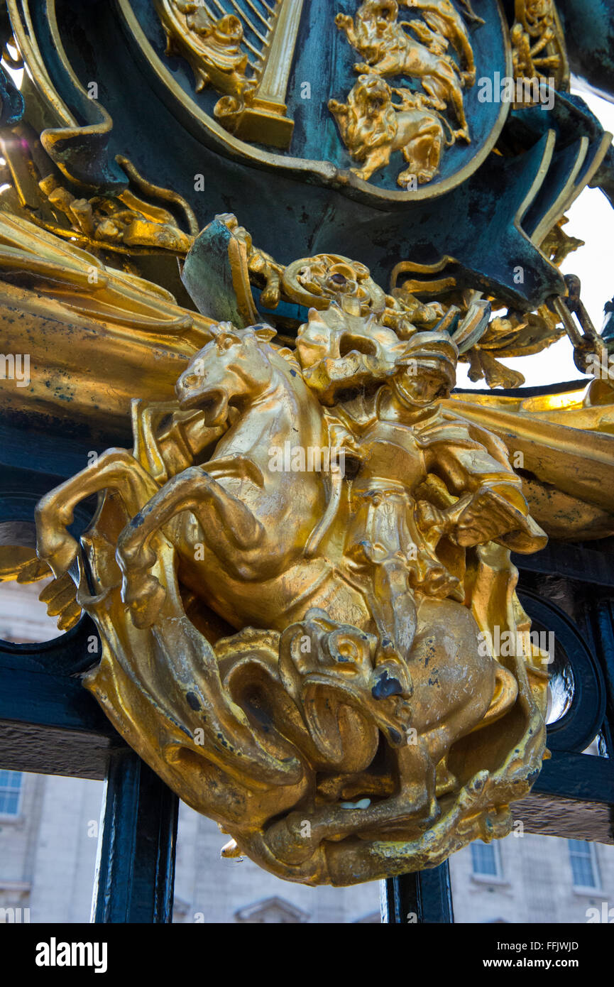 Buckingham Palace main metal gate with golden gilded ornaments, London, United Kingdom. Stock Photo