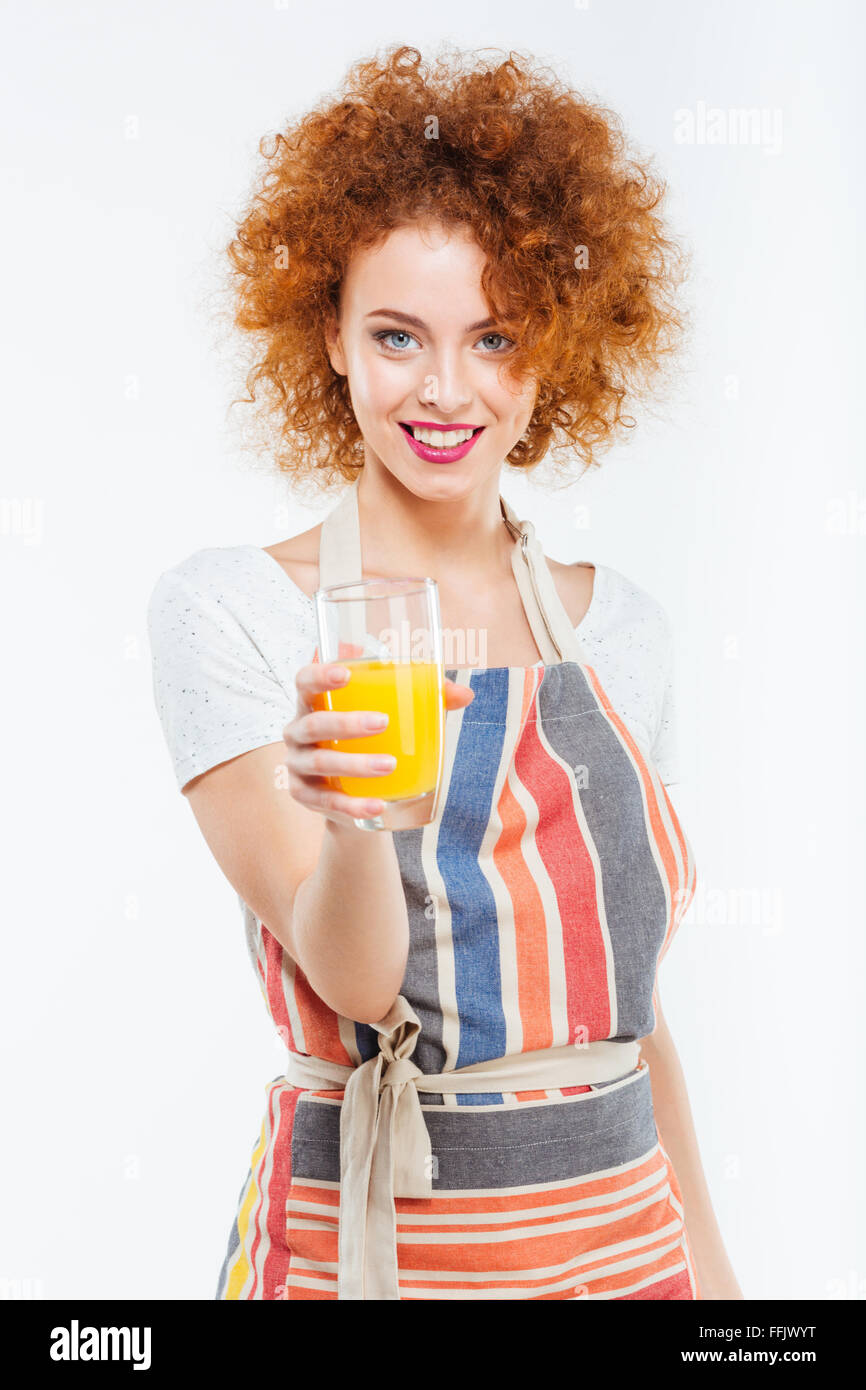 beautiful-happy-redhead-young-woman-in-striped-apron-smiling-and-holding-FFJWYT.jpg
