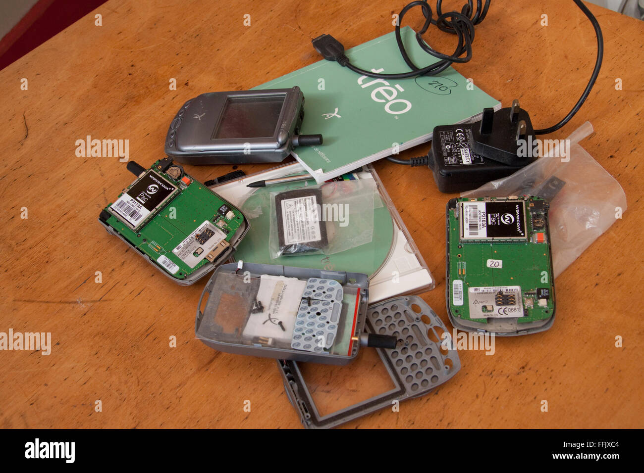 Pile of Handspring Treo smart phones and components Stock Photo