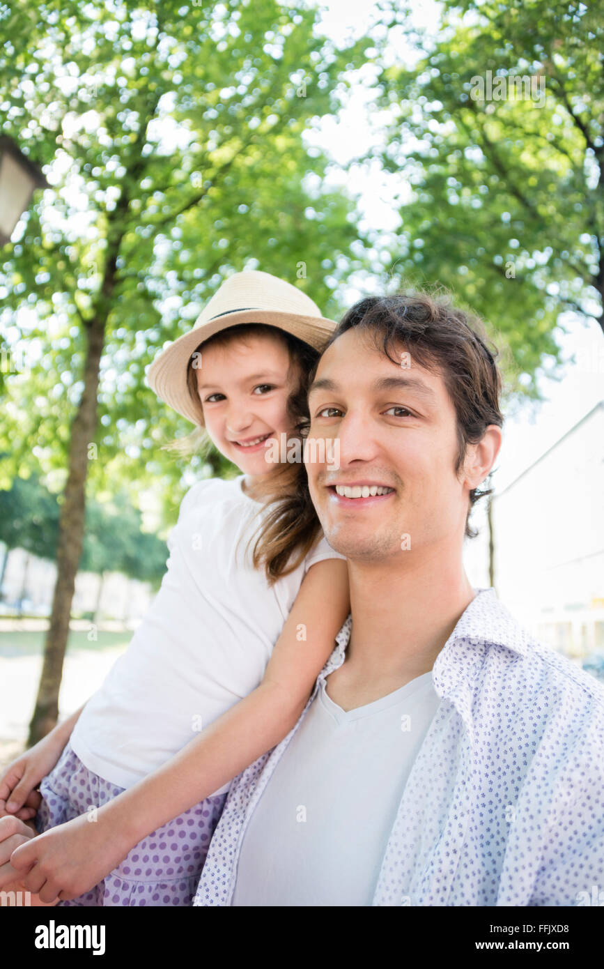 Portrait of father and daughter outdoors Stock Photo