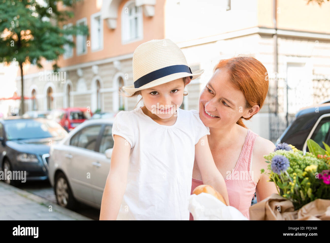 Portrait of mother with daughter in city Stock Photo
