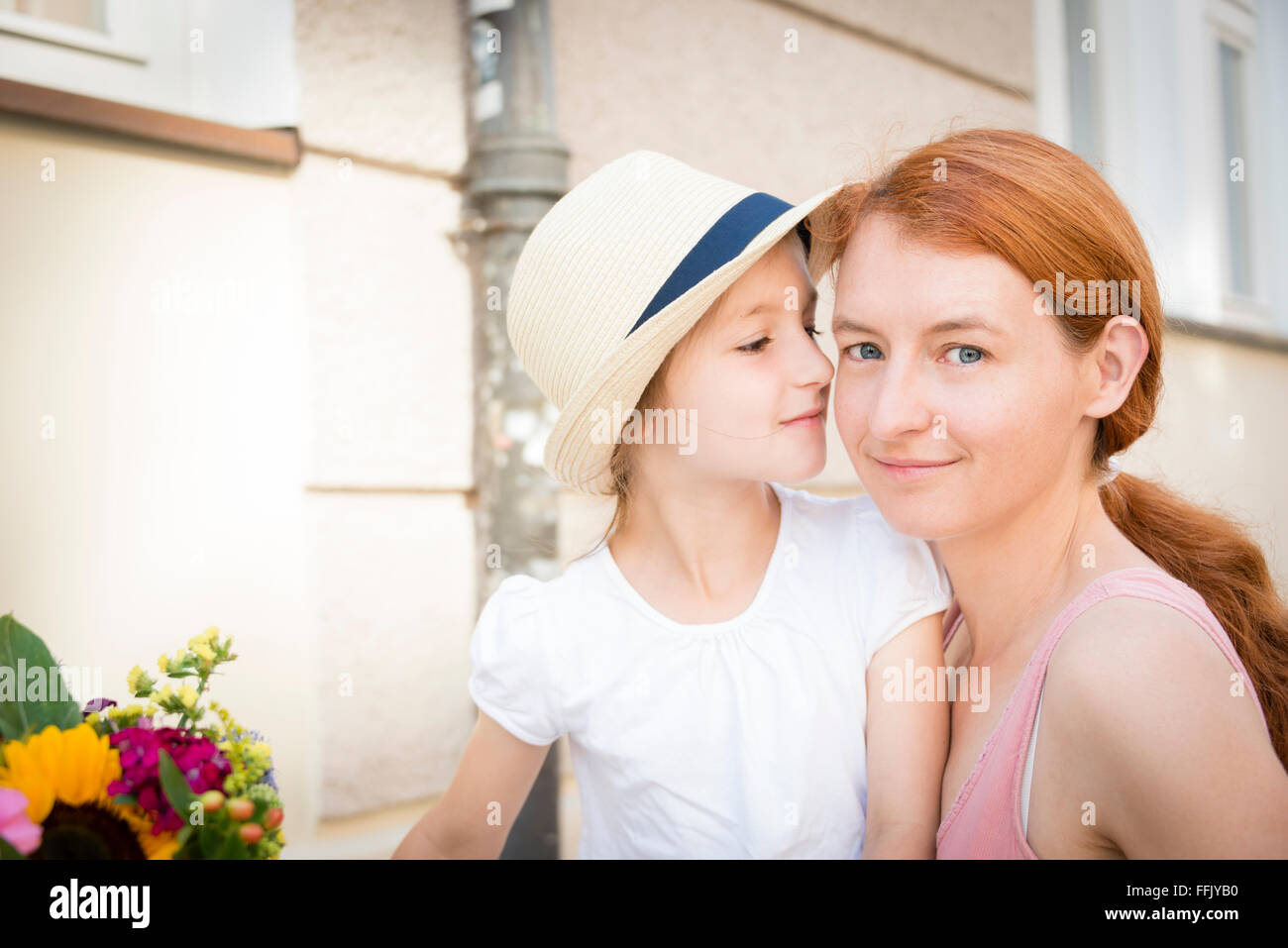 Portrait of mother with daughter in city Stock Photo