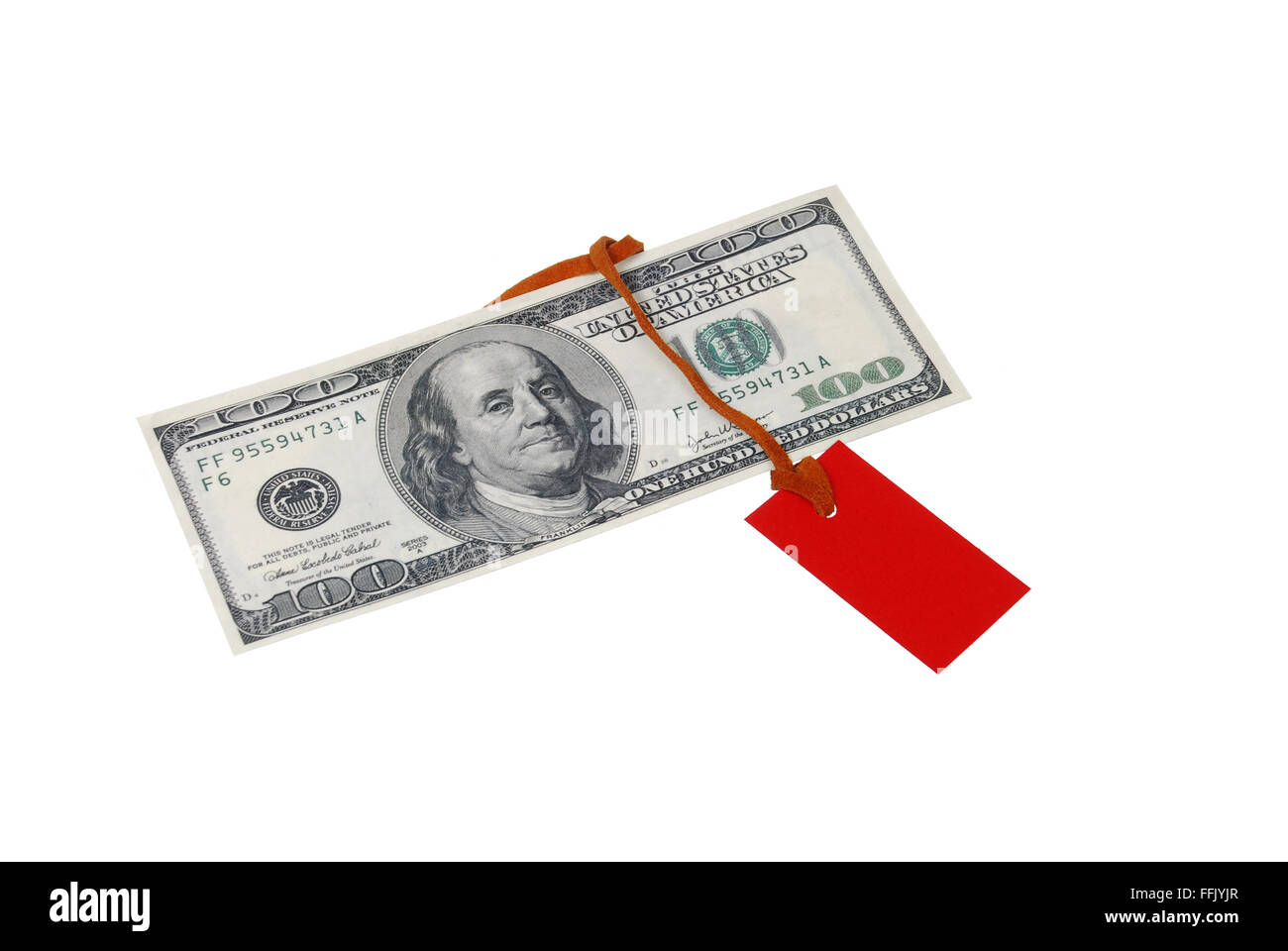 $ 100 bill with a red tag on brown leather rope on a white background Stock Photo