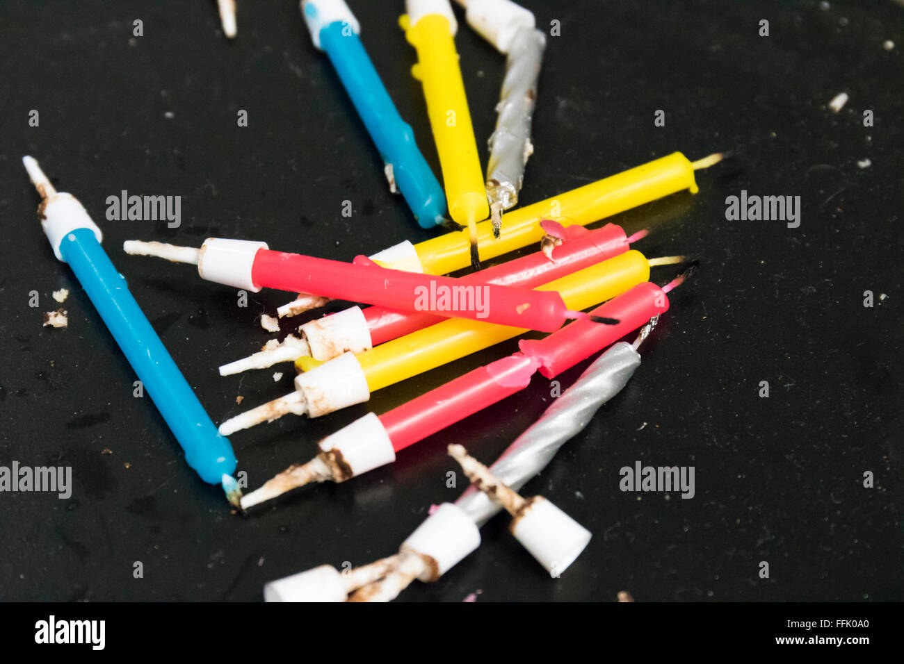 small birthday candles on black background Stock Photo Alamy