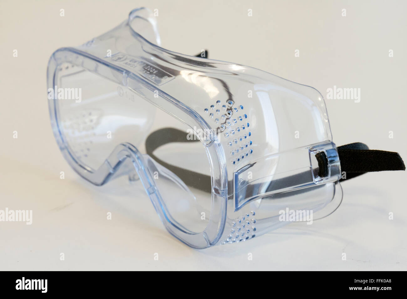 plastic safety goggles on white background Stock Photo