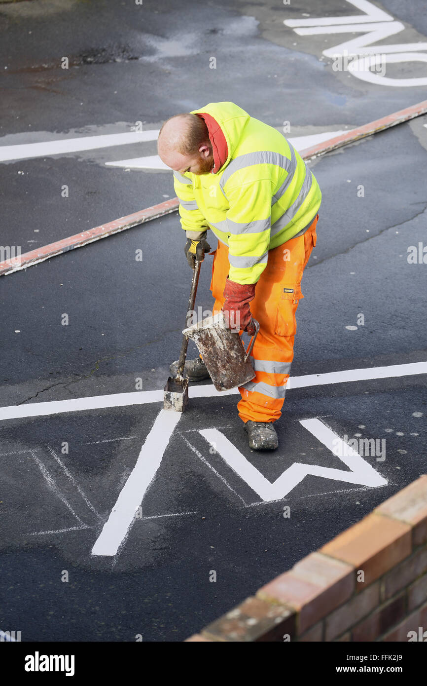 Contractor road marking in a public car park Stock Photo Alamy